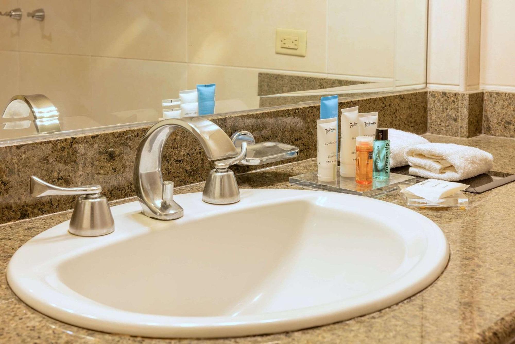 Radisson Hotel Panama Canal Bagian luar foto A typical bathroom sink